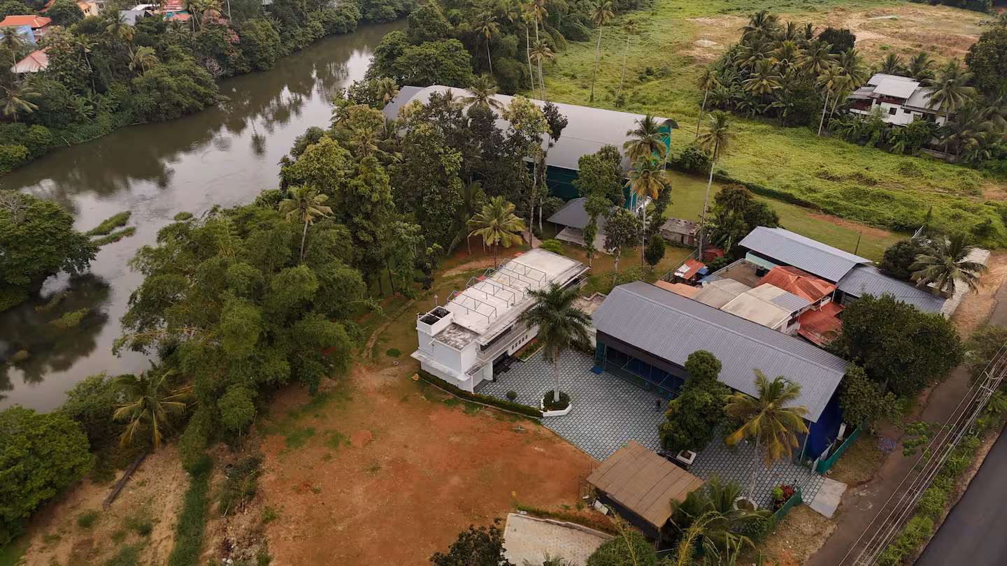 Beautiful view of the Manimala River flowing past the villa's private frontage